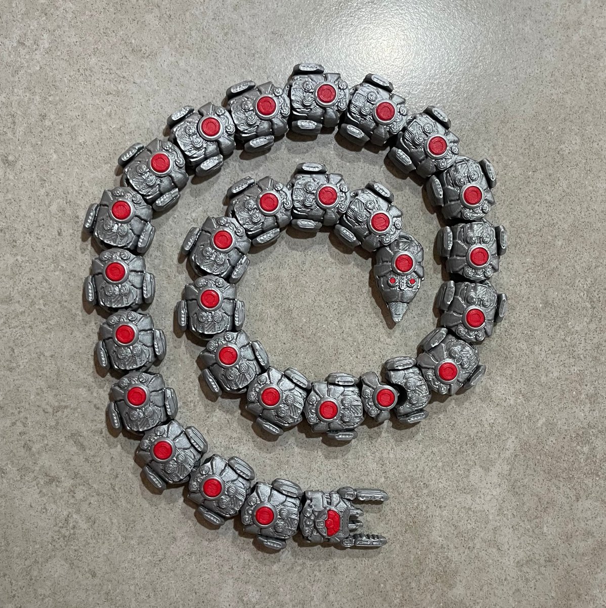 Hiya everyone!

Just letting you all know the articulated slithering mechanical menace that is "The Destroyer" is now available on my shop!