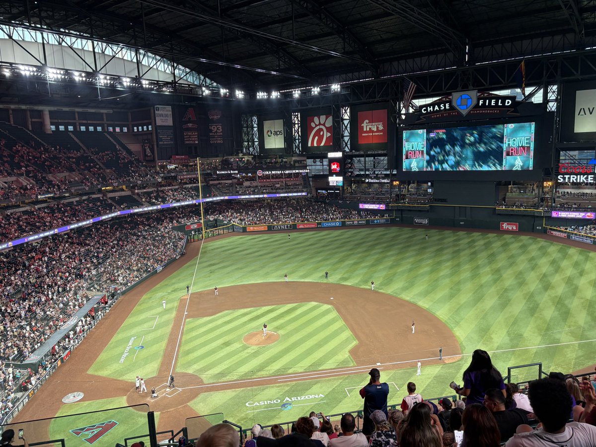 Intently watching the Diamondbacks score their first run.
