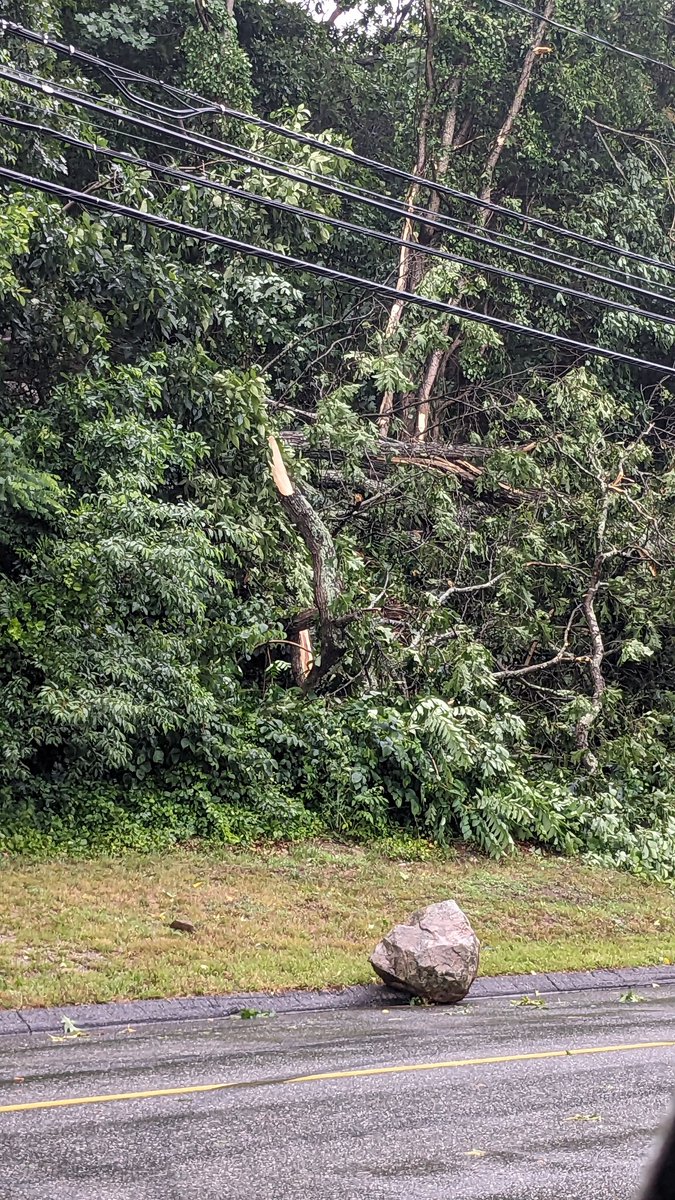 DFANewHaven's tweet photo. I was going to a show at the Ivoryton Playhouse when a huge thunderstorm came and knocked out power to the theater. The show was cancelled. Nearby on Main Street this boulder got dislodged and rolled down the hill into the road. #storm #essex #weather https://t.co/bnGMsixGLd