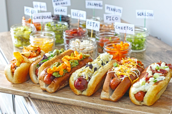 Hi everyone! Sorry I'm running a bit late. *sets up build your own hot dog bar for everyone* #nipclub