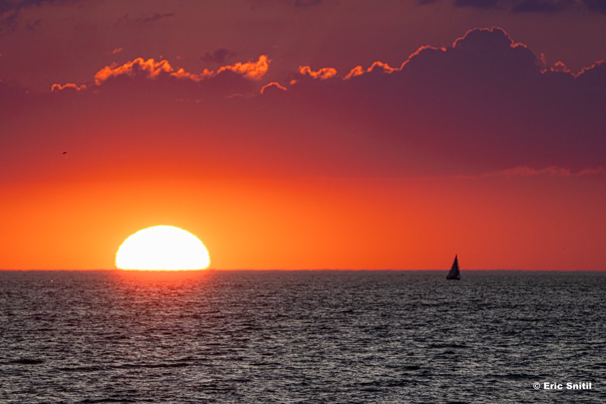 The first sunset of July 2025, captured from Webster, New York.