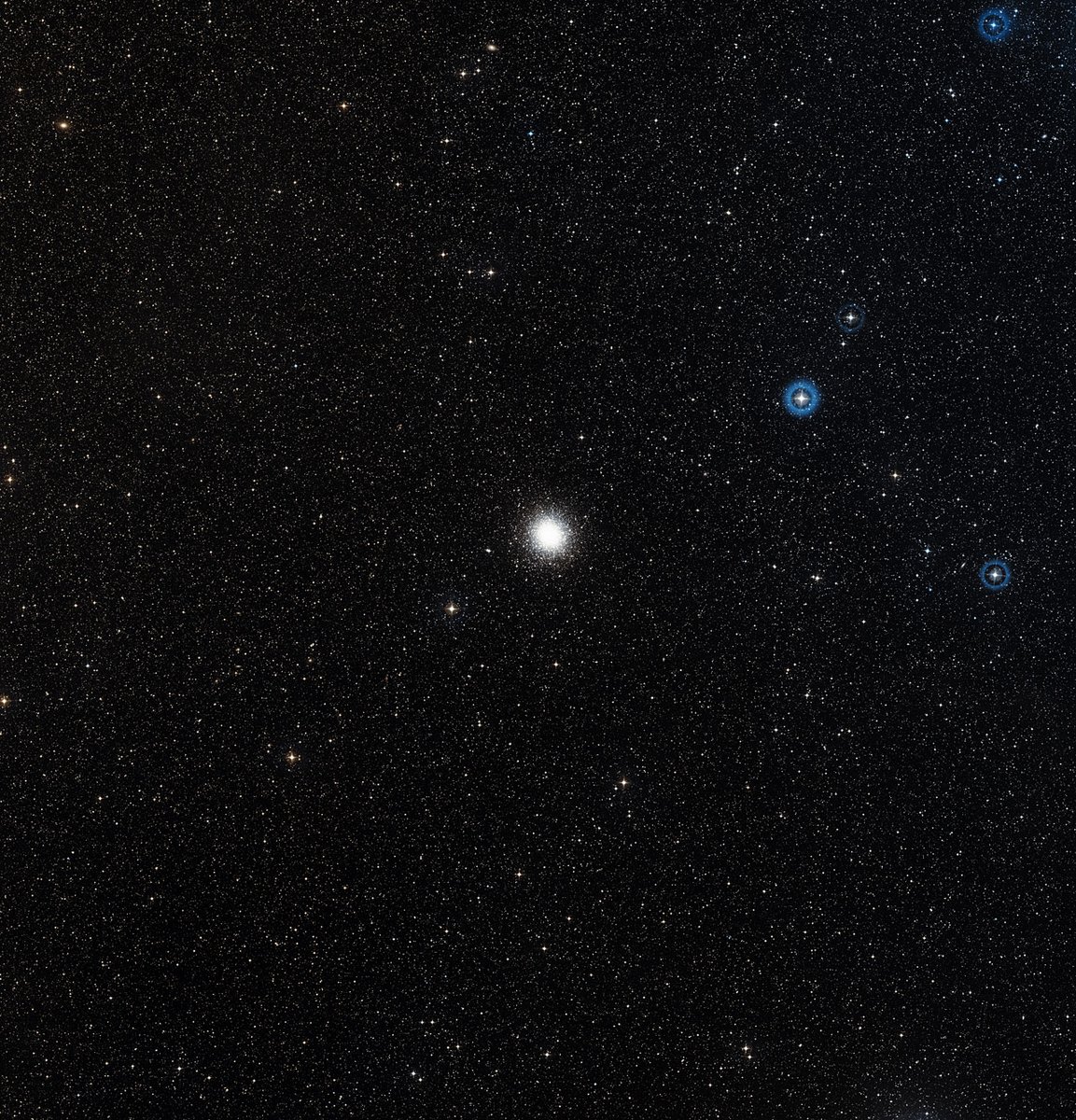 This wide-field image from the Digitized Sky Survey shows NGC 2808 in its stellar environment. The field of view spans 2.7 by 2.8 degrees, revealing the dense star field of the Milky Way in the constellation Carina.