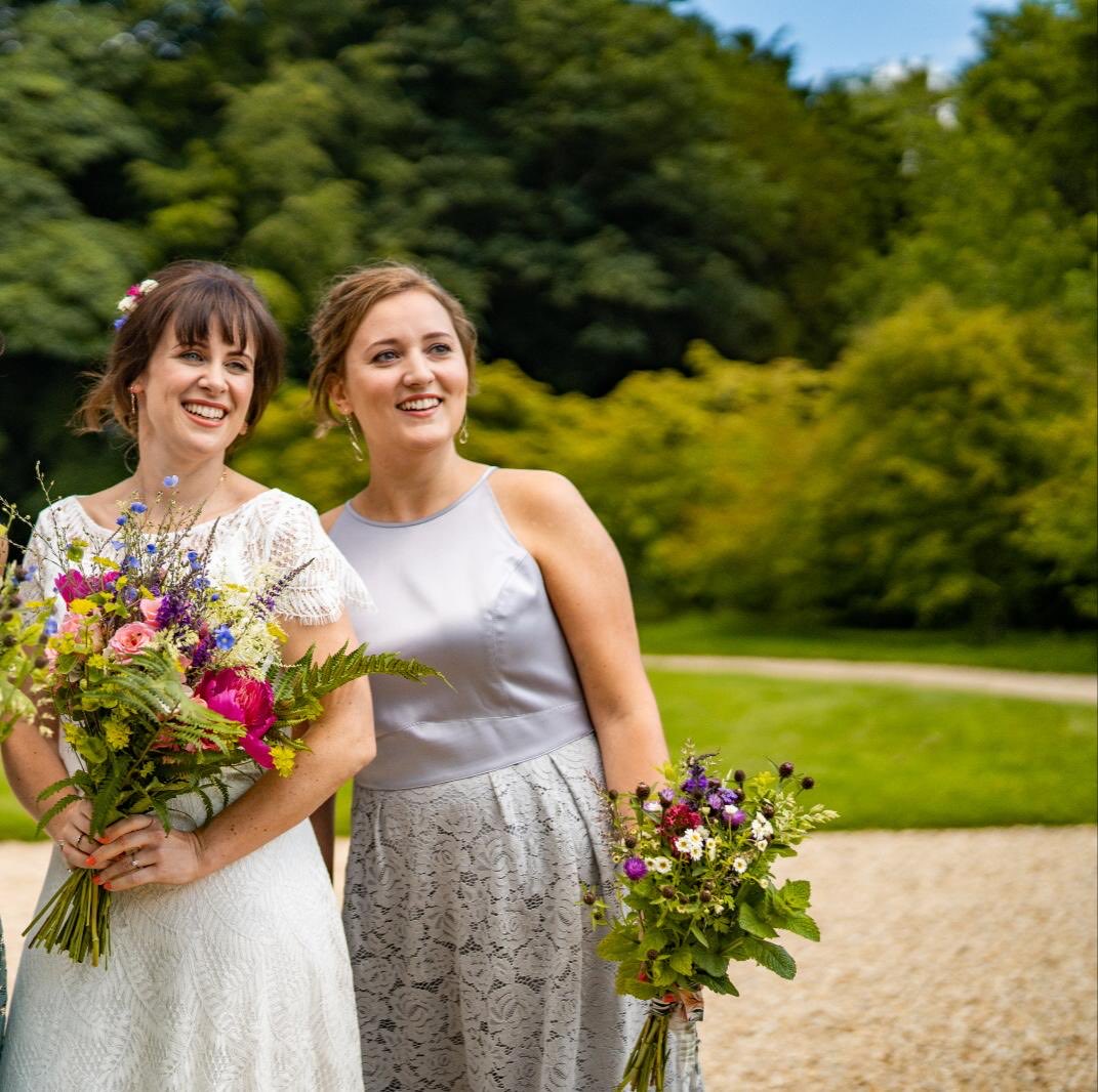 One of our favourite Brides with her Bridesmaid! Ferns Roses Feverfew Cornflowers! Cooler today thank goodness off supporting husband playing golf telling him what he’s doing wrong!! 😄have a good day! #britishflowers