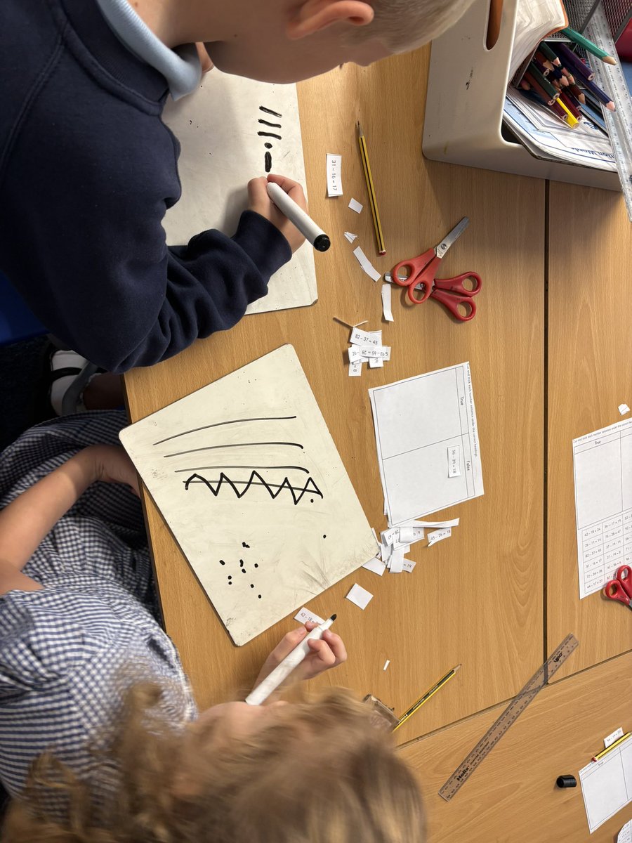 CCCRPrimary's tweet photo. Year 2 are exploring how they can work out whether calculations are true or false using their base ten knowledge! #CCCRMaths https://t.co/XOzpluFJzM