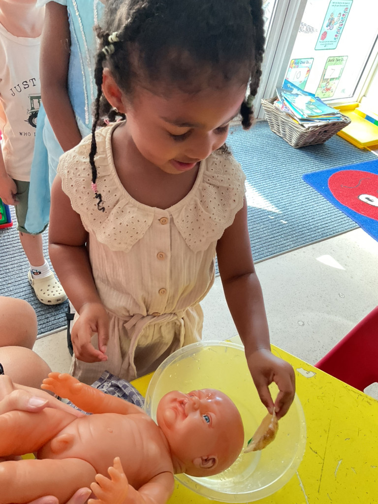 This week in RE, Nursery learnt how the priest uses the Oil of Chrism and water during Baptism. Nursery were then given the opportunity to Baptise a baby doll of their choice.