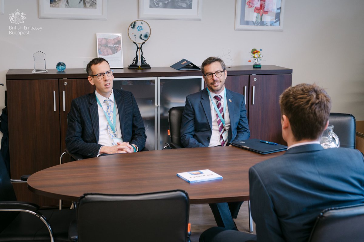 ukinhungary's tweet photo. Chargé d’Affaires @AndrewxDavidson &amp; 2nd Sec Leslie Hayler visited @BISBudapest to meet with Principal Ben Turner. Andrew opened the end-of-year assembly &amp; together with Leslie, presented Duke of Edinburgh’s Bronze &amp; Silver Awards to students. Congrats to all the recipients! 🎉 https://t.co/NBv58OakID