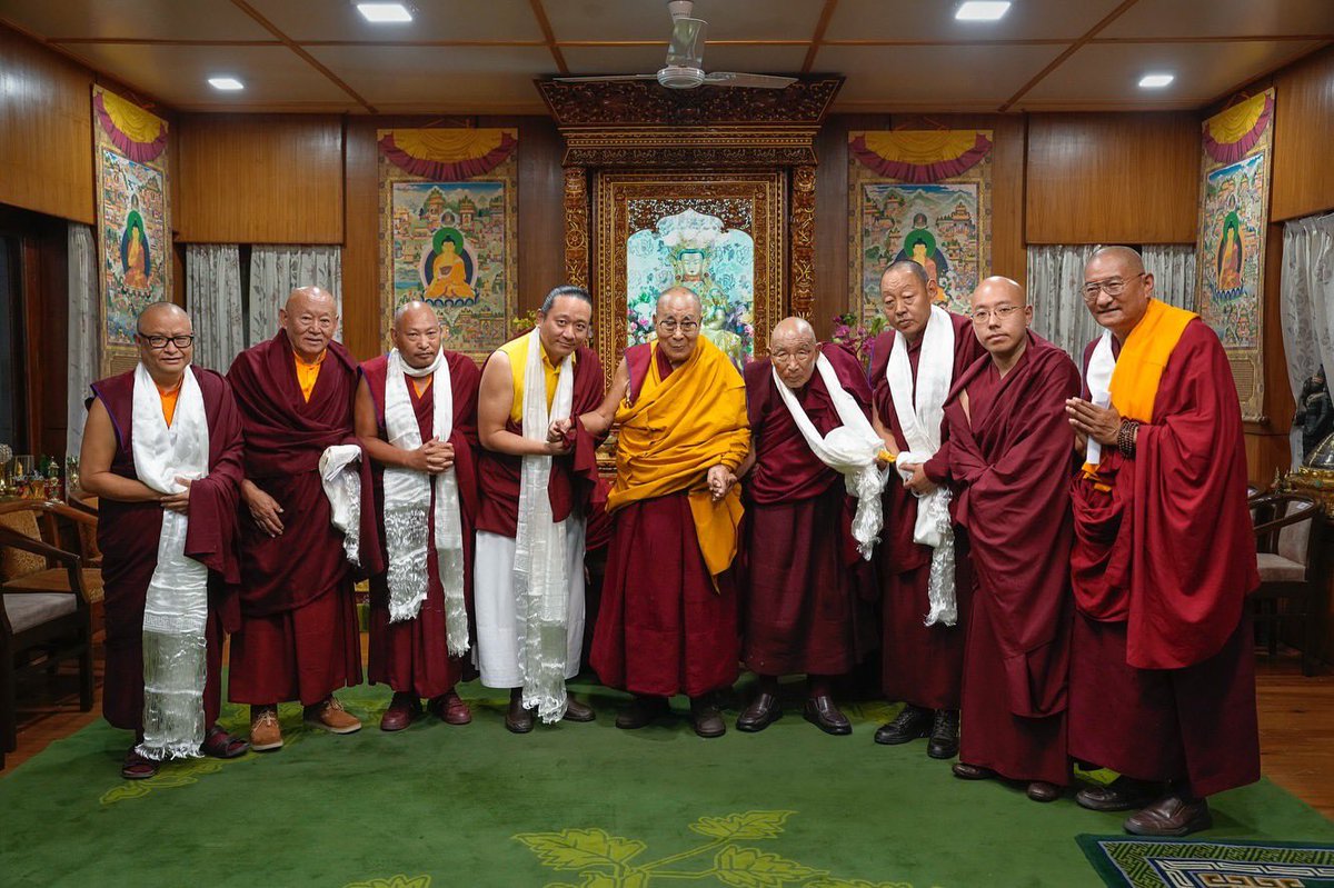 His Holiness the 14th Dalai Lama is pictured with 8 high Lamas of Tibetan Buddhism and Bon tradition.