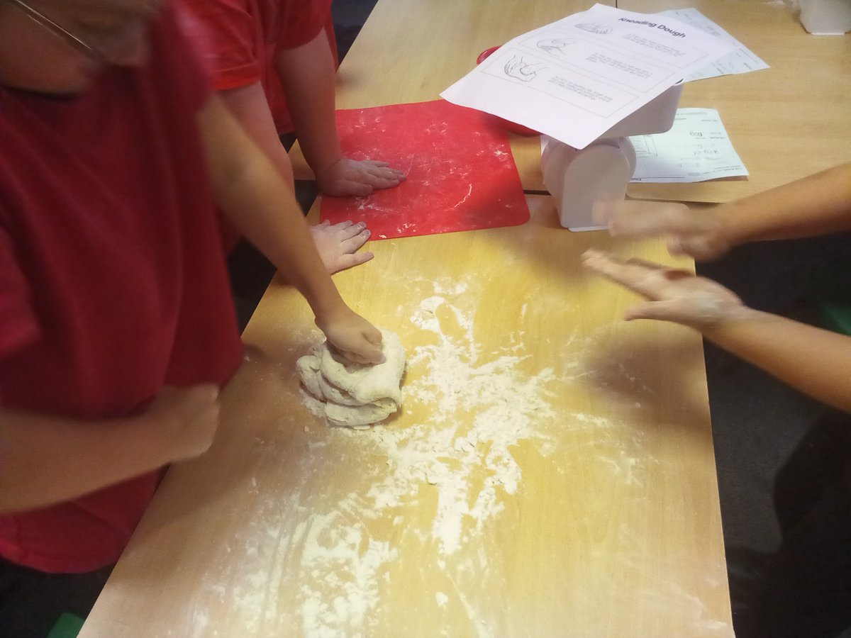 Kneading our dough as part of our bread making process for DT day