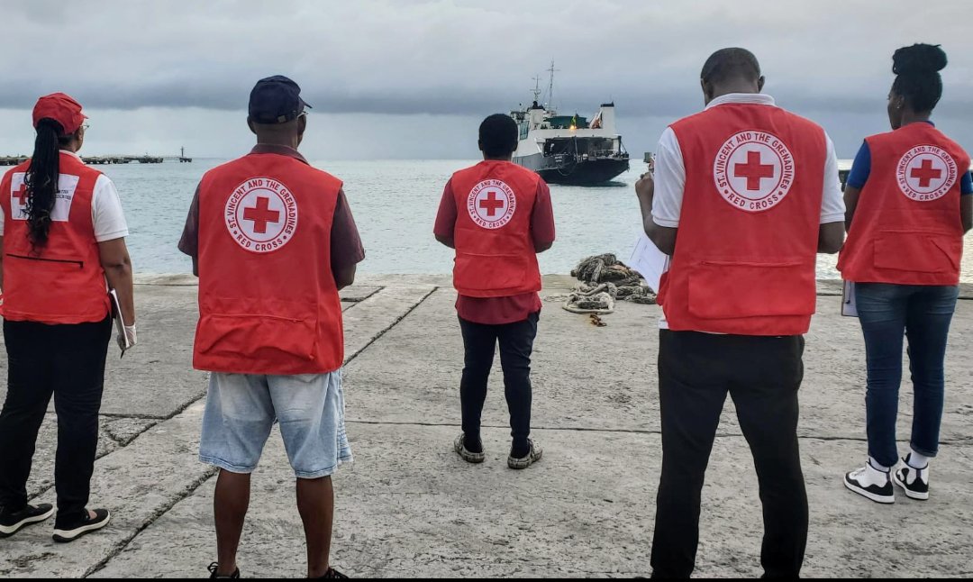 On the 2nd July 2024, the SVG Red Cross responded in the aftermath of the devastation of Hurricane Beryl.  Here, volunteers await the MV Gemstar bringing  evacuees from the Southern Grenadines. We remember. #redcrossstrong