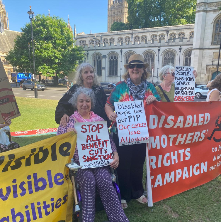 WinVisibleWomen's tweet photo. Joy Dove, campaigner for #JusticeForJodey with us on Monday's #StopDisabilityBenefitCuts protest. The second inquest found DWP responsible for mum Jodey's death after cruel cutoff from ESA. Jodey was too ill to attend assessment and worried sick about debts. @NotSeparation https://t.co/6zncgLpn1h