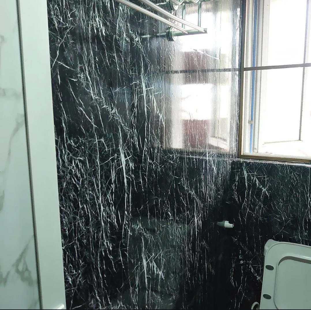 AmazingDecors's tweet photo. Check out these photos of the work we did in our client's washroom! We put up some glossy black marble contact paper with white stripes, and it looks amazing! https://t.co/kGe5AopFYo