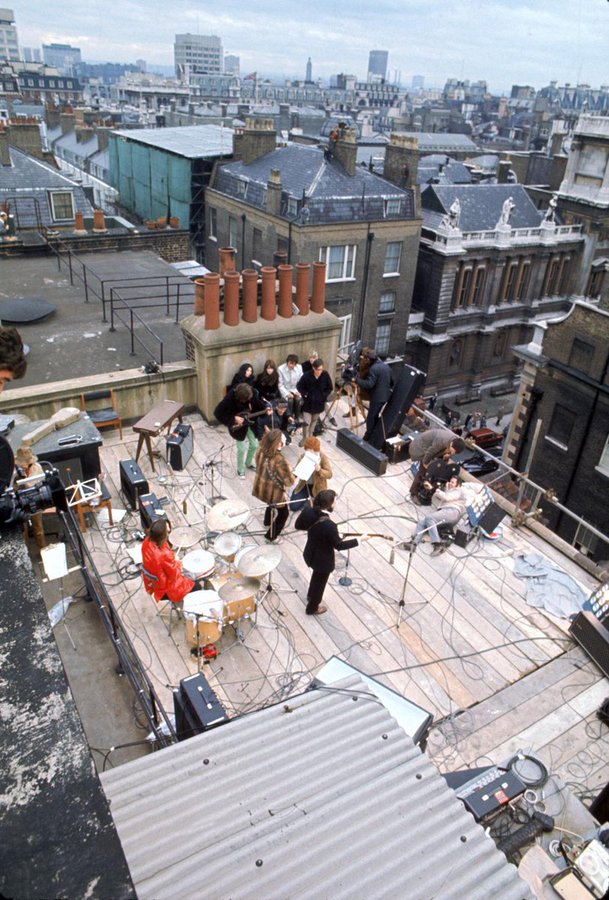 crockpics's tweet photo. Aerial shot of the Beatles rooftop concert, 1969 https://t.co/sPNVXNLboB