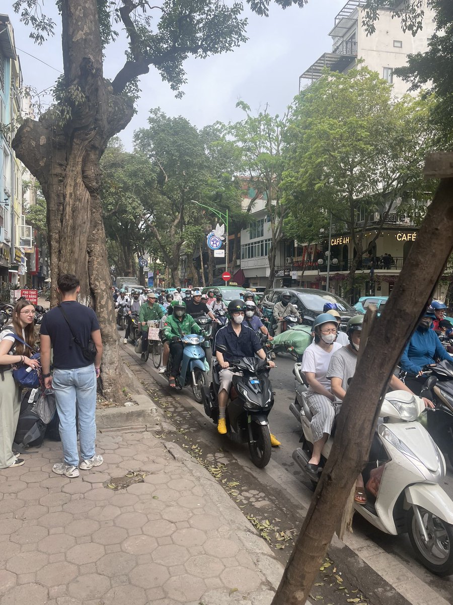 DTrainGorry's tweet photo. @AvidCommentator This was an Hanoi Street on a Saturday morning just a few months ago. Imagine thousands of SUV’s added to these streets. https://t.co/IOAbe7zAcI