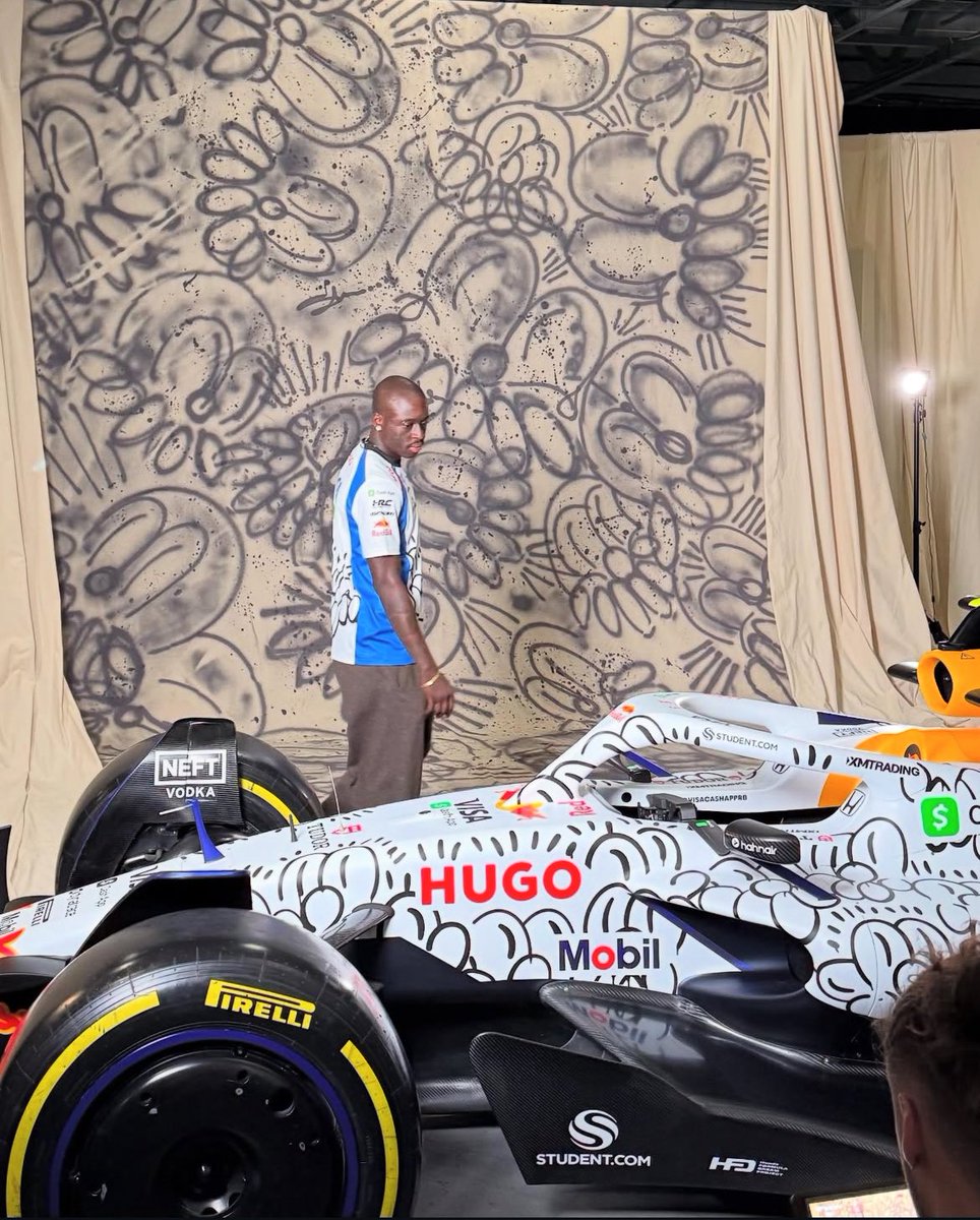 TheUpperEnt's tweet photo. Olaolu Slawn becomes the FIRST artist globally to feature his work on an F1 car racing at the British Grand Prix.🏎️🩷 https://t.co/Y00tU4ybXk