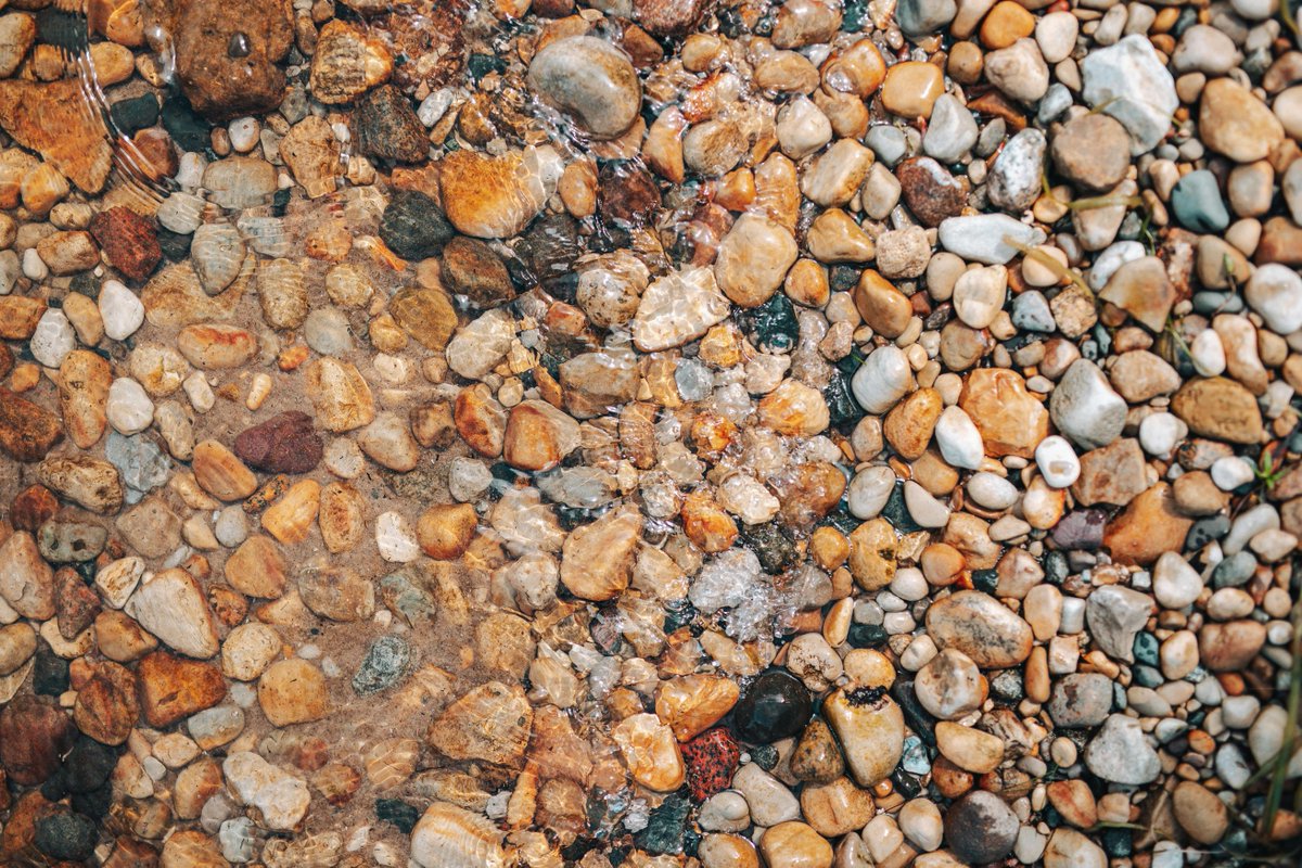 Clear Water Pebble Beach with Large Rocks.
<a href="/USATODAY/">USA TODAY</a>