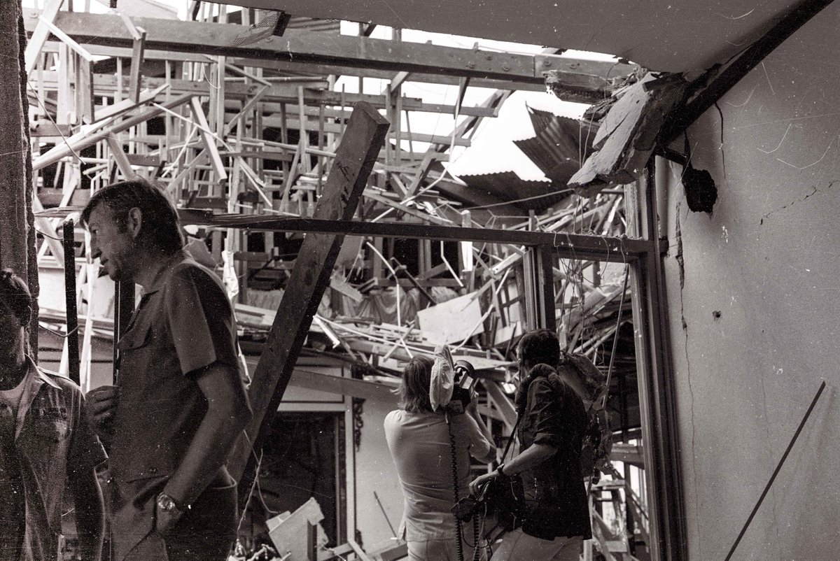 PeterWiles's tweet photo. Sad to hear of Sandy Gall's death. My photo of him at work in Saigon in April 1975 after a North Vietnamese rocket hit the top floor of the Majestic Hotel https://t.co/GQV4NluUJ5 #Vietnam #Saigon #SandyGall https://t.co/DuQ0cNVtsT