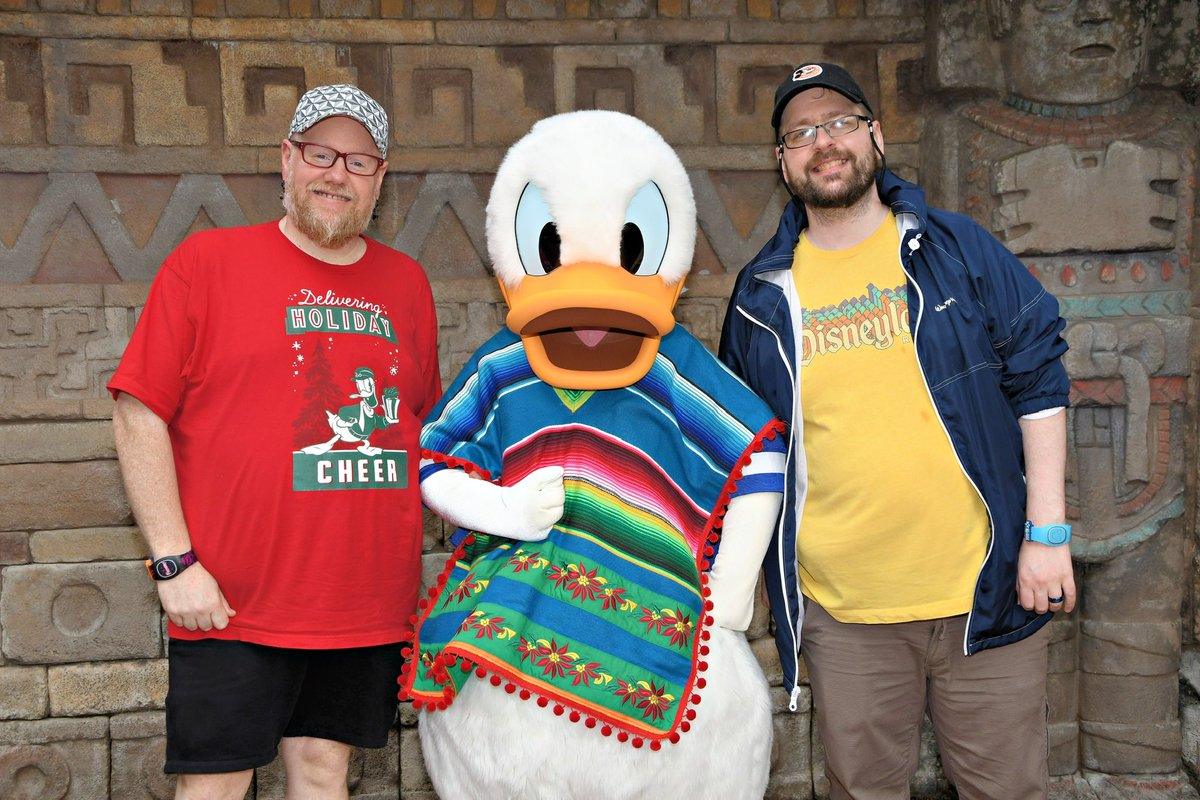 ScottBurress's tweet photo. @ScottJenningsKY just my husband and I enjoying Disney without kids. If you’re not a coward come and get us and try to put us away. https://t.co/NhoW0LxJqn