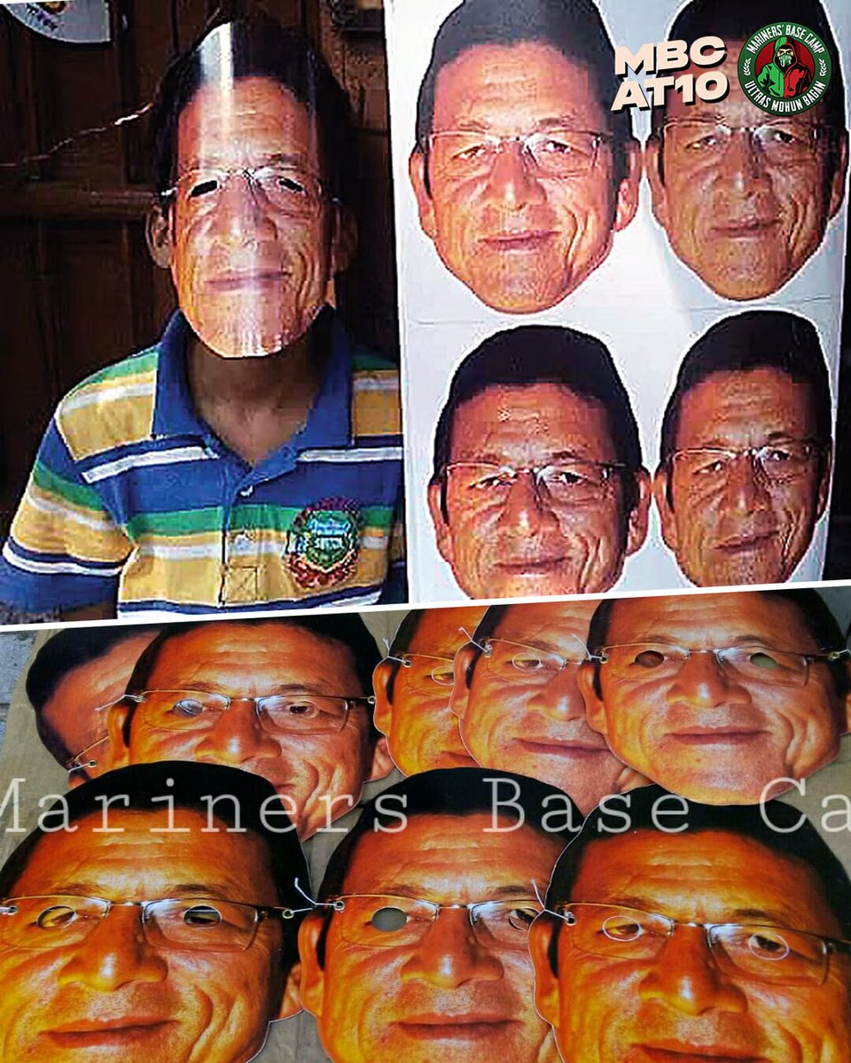 হাতে ঘড়ি গলায় চেন 
সাথে আছি সঞ্জয় সেন।

Suspended on paper. Immortal in the stands.
10,000 masks. One message. Barasat stood with Sanjoy Sen. 🎭💚❤️

#MBCat10 #UltrasMohunBagan #MarinersBaseCamp #SenEra #JoyMohunBagan