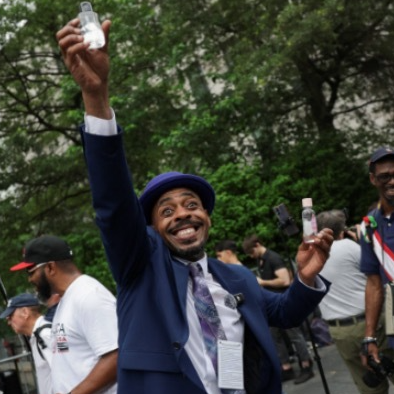 Diddy fans spray baby oil outside court...