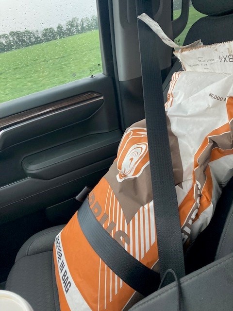 BurrusSeed's tweet image. Pop-up showers don&apos;t stop delivery of last minute seed needs! #BurrusSeed Account Manager Kirk Jackson has an important shotgun passenger.