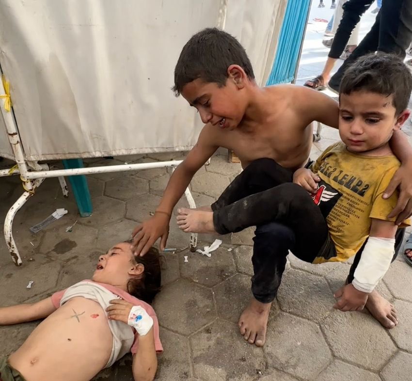 nahed_hajjaj99's tweet image. A photo of 10-year-old Zain taking care of his siblings after an airstrike.
You’ve forced our children to become parents to each other. To take care of each other after airstrikes and after their parents are brutally murdered.
How can the world do this to children?