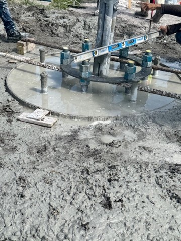 The Yamato Road Resurfacing team makes sure the newly installed mast arm cage is level.  A solid foundation starts with a mast arm cage — it anchors traffic signals and keeps them stable. Using a level during installation ensures it’s aligned for max safety and signal accuracy.🚦
