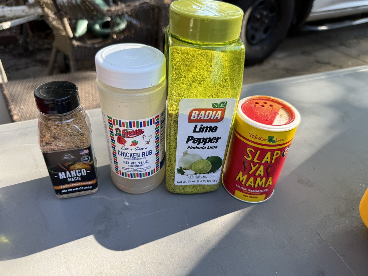 senoroukc's tweet photo. Decided to play mad scientist w/my dry rubs today: Slap Ya Mama Hot, Lime Pepper, Mango Magic, &amp; some Chicken Rub.

Because why not risk my taste buds for science? 🔥

And obviously, cooking it all next to my Steelers Igloo cooler… priorities, people.

#BBQExperiment #SpiceItUp https://t.co/5S6b7vjMX5