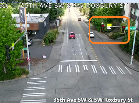 Миготливі червоні сигнали на SW Roxbury ST на 35