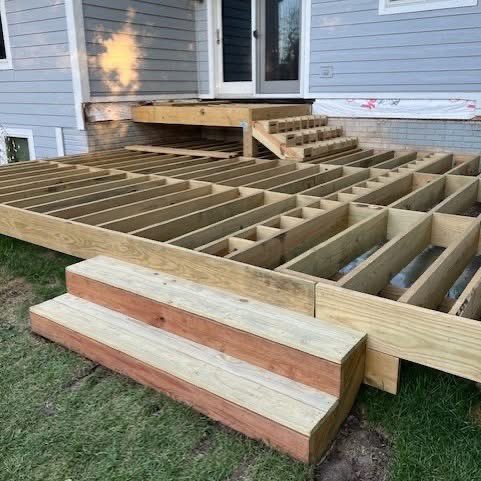 Shoutout to Travis from Des Moines! Using the UglyDeck.com DIY Assist Program, Travis framed this ground-level deck w/ oversized balcony stairs &amp; absolutely crushed it. Our team installed the ledger &amp; footings, then handed Travis the blueprints, materials to finish.