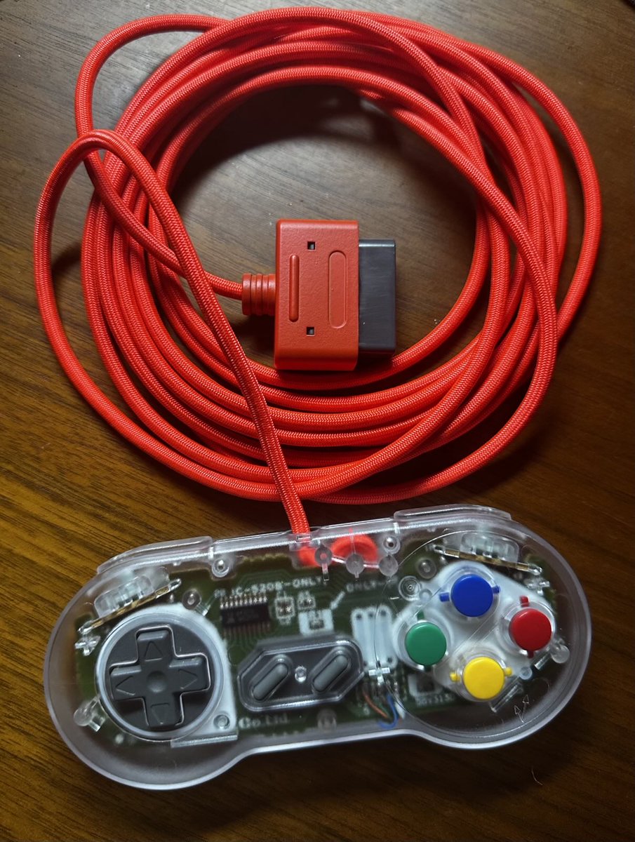 david_9up's tweet image. New braided cables with transparent SNES controller shells from RGR @RgRDev and the adapter shell custom-painted by a local airbrush artist #snes #transparent #airbrush