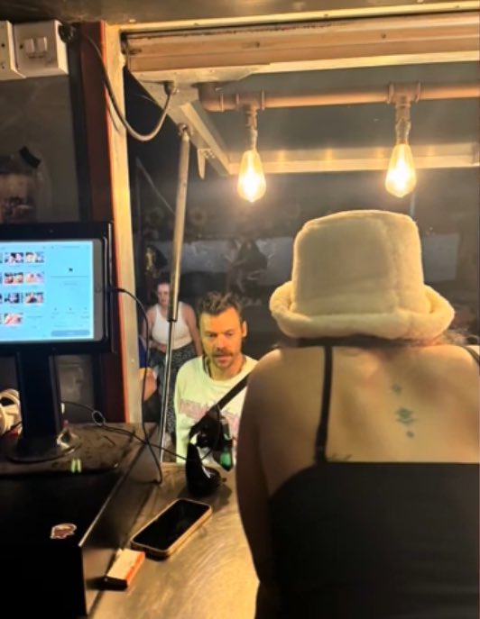 hsdaily's tweet image. Harry ordering some food and hugging at Glastonbury recently! (via lo.saunders)