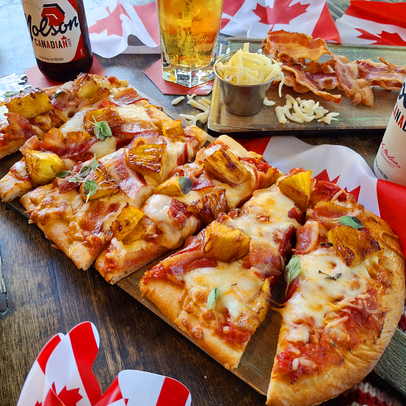 🇨🇦🍍Fun Fact: Hawaiian Pizza? Totally Canadian.🍕🇨🇦

Invented in Ontario. Loved around the world (Sorry, not sorry).

Reimagined as our Hawaiian Flatbread, part of our Unapologetically Canadian menu at Firkin Pubs.

Cheesy, tangy, sweet and a little controversial 😏