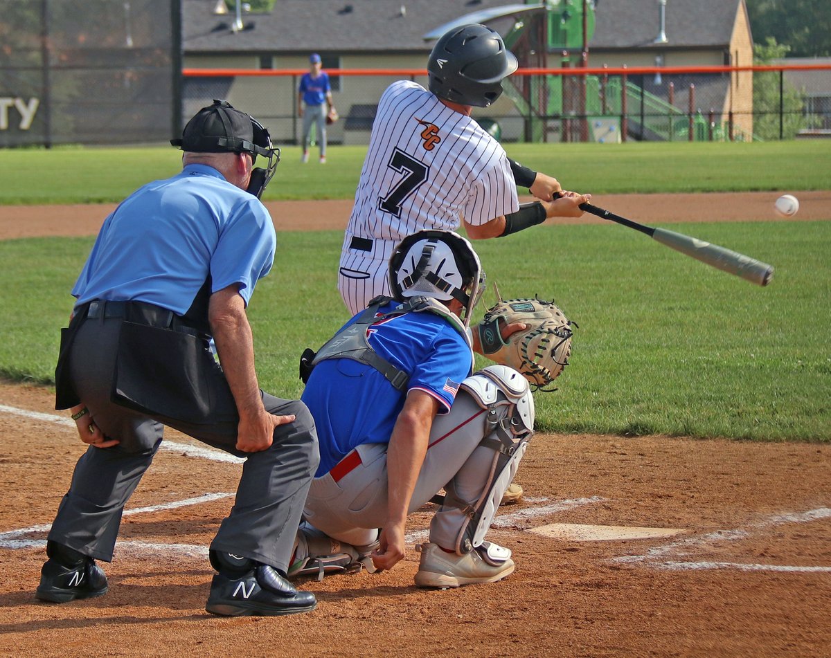 Charles City junior Holden McInroy makes contact during the first game of Tuesday’s NEIC baseball doubleheader against Decorah at Comet Field. The Vikings won both games by the same score (12-1).
…citypress-ia-siteadmin.newsmemory.com/charlescitypre……air-of-12-1-wins/
