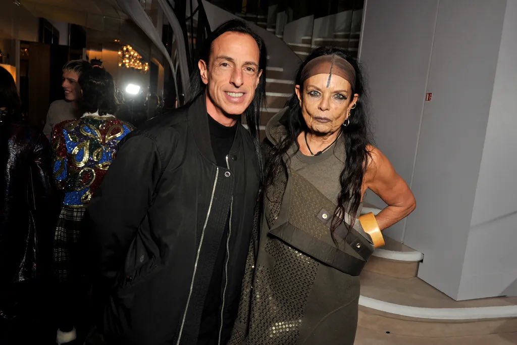 rianphin's tweet photo. adam small just made a video about how people accuse rick owens and michele lamy of being evil and demonic because of how they dress, meanwhile men in suits commit atrocities everyday https://t.co/kJRaibFgLe