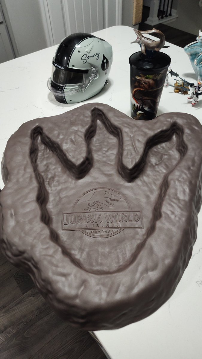 Just watched #JurassicWorldRebirth at #amc and had a great time. Amazing movie and sound! They hired a dinosaur for the lobby and it was packed! Go see it APES. Also picked up some more merch. We can hit 3 billion this quarter if we all work together!