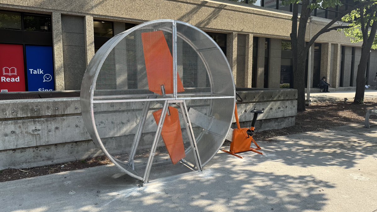 brent_bellamy's tweet image. Really exciting to see Graham Avenue being transformed into Winnipeg’s first permanent pedestrian street. @CoolStreetsWPG is painting the pavement. Planters, furniture and art is being installed - including a giant fan that can be pedaled to cool people off.