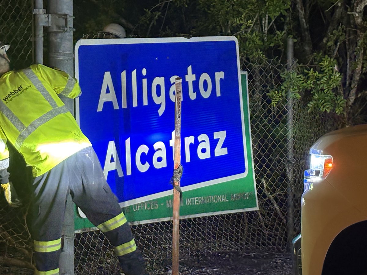 DavidGoodhue's tweet image. Workers just replaced the Dade Collier Training and Transition Airport with an Alligator Alcatraz sign