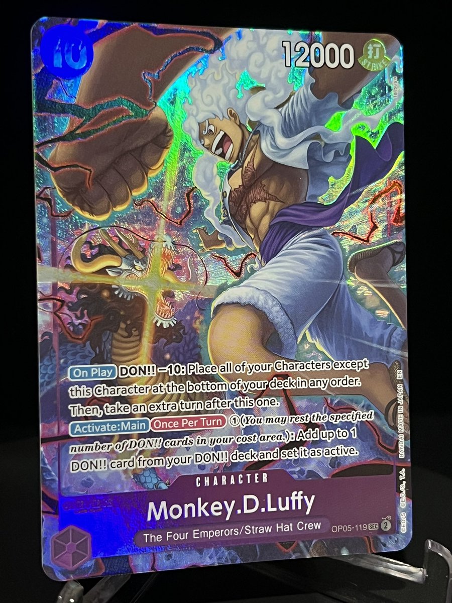MrAllSunday_TCG's tweet photo. Here’s some close-up pics of Gear 5 Luffy from the One Piece English 2nd Anniversary Set! 

This art is spectacular, highlighting the extremely-anticipated G5 Luffy vs Kaido ending of the Wano Arc! 

#tcg #onepiece #optcg #onepiececardgame #ワンピースカードゲーム #ワンピース https://t.co/Lj8wUfGUFs