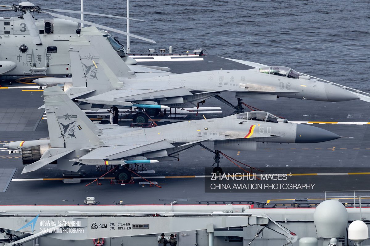 stella991214's tweet image. The J-15 and J-15T on the CV-17 Shandong aircraft carrier. This is a rare image. According to the JMSDF(Japan Maritime Self-Defense Force), this J-15 was previously observed conducting aerial surveillance of a P-3C aircraft.