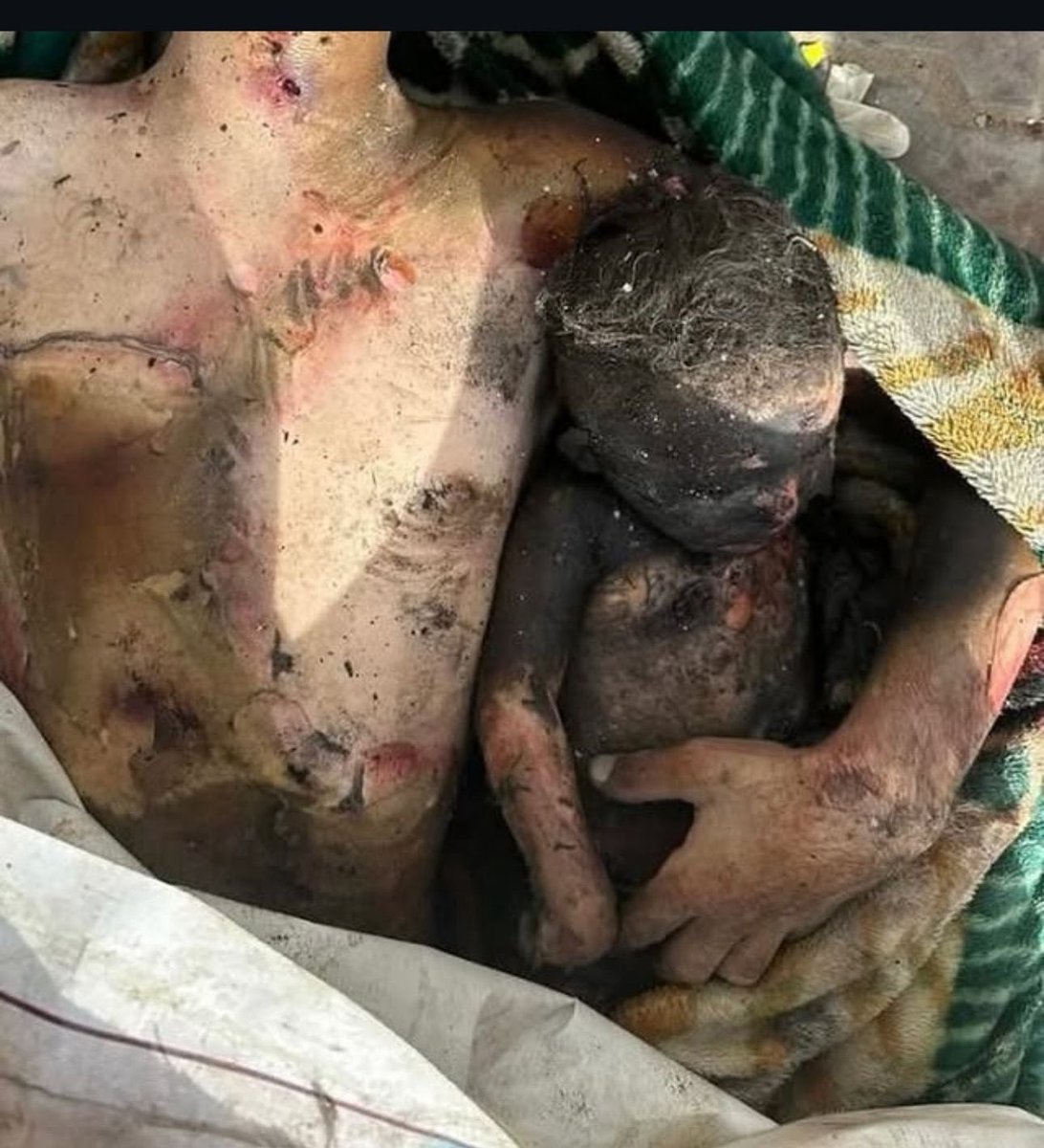 TareqAzzom's tweet image. I’ve run out of words to describe the scale of brutality unfolding across Gaza. Today, I found myself staring at this photo for hours — frozen by the details. A father, lifeless, clutching his son’s body in his arms. Both killed. But even in death, their embrace speaks loudly.