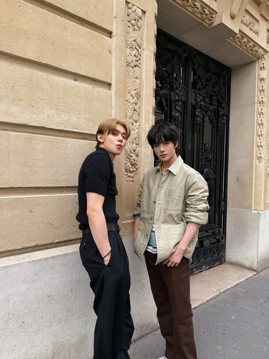 Took this shot right before the chaos kicked in me tryna keep it cool while Beomgyu was already plotting something wild behind that innocent stare. One arm around me, the other probably ready to pull some kind of prank five seconds later.