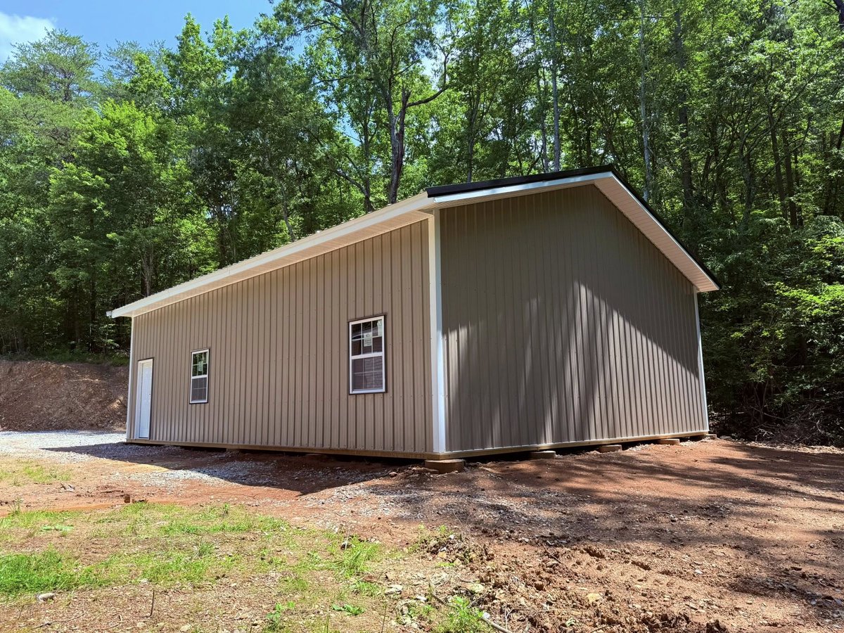 truemetalsupply's tweet image. Take a look at this stunning post frame kit installed by Corman Builders LLC ! Featuring Clay Tuff-Rib metal siding, Black Tuff-Rib roofing, crisp white trim, and durable steel trusses, this beautiful hobby shop is designed to impress—and built to stand the test of time. Contact…