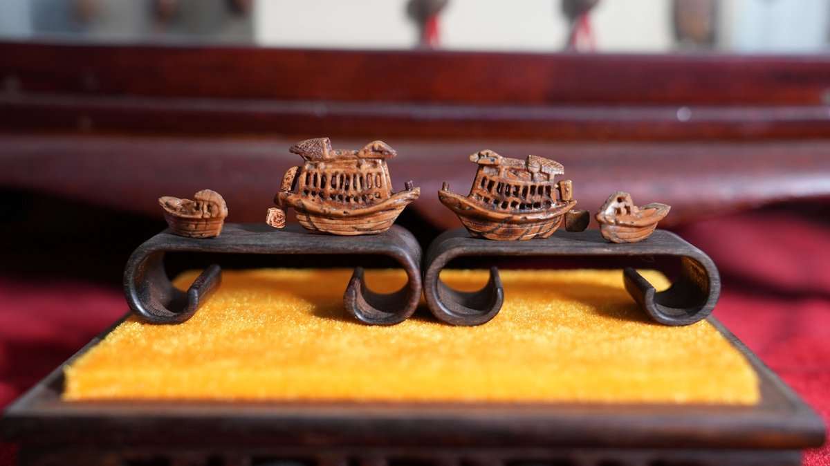 izhejiang's tweet photo. ⛵On the 104th anniversary of the Communist Party of China's founding, master carver Hu Yinsong donated a miniature #RedBoat to the Tongxiang Archives — hand-carved from peach pits over the course of 6 months. It is only 4cm long, yet rich in history, spirit, and craftsmanship. https://t.co/DAaKx1BVzH