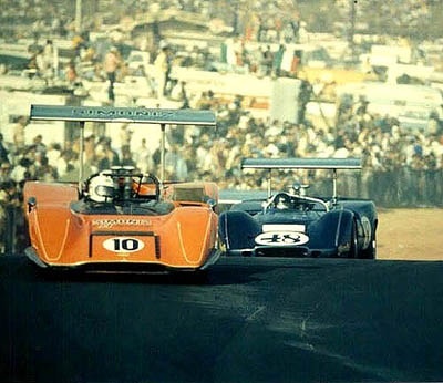 #ThrowbackThursday , 1969 Riverside #CanAm, Charlie Parsons in the Carl Haas Lola T-169 &amp; Dan Gurney in his AAR-modified 'McLeagle-Chevy ( after numerous engine problems, AAR put Chevy power in for this race ) Look at the crowd, Can-Am races packed Riverside International #racing