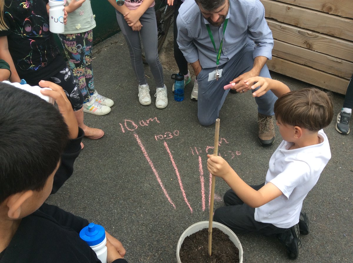 Class 3's very own sundial has started to work!  Lots of scientific discussion taking place too...