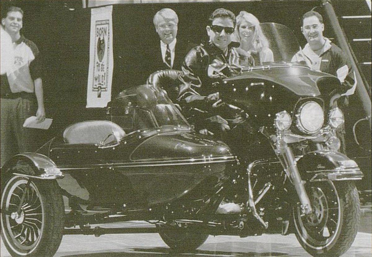 catsclassics's tweet image. Rick Pitino rides a Harley-Davidson to Born To Be Wild at Big Blue Madness 1994.