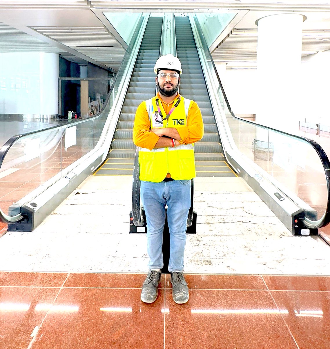 Meet Mr. Anshul Verma, an expert working on the escalators at #NIAirport. 

He’s ensuring seamless movement for thousands of passengers by keeping every step safe, smooth, and ready. #FromTheGroundUp