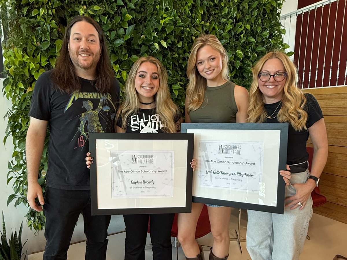 So proud to present Daphne Browdy and Elby Faser with their framed certificates and checks from being some of the Abe Olman Scholarship recipients this year 🎖