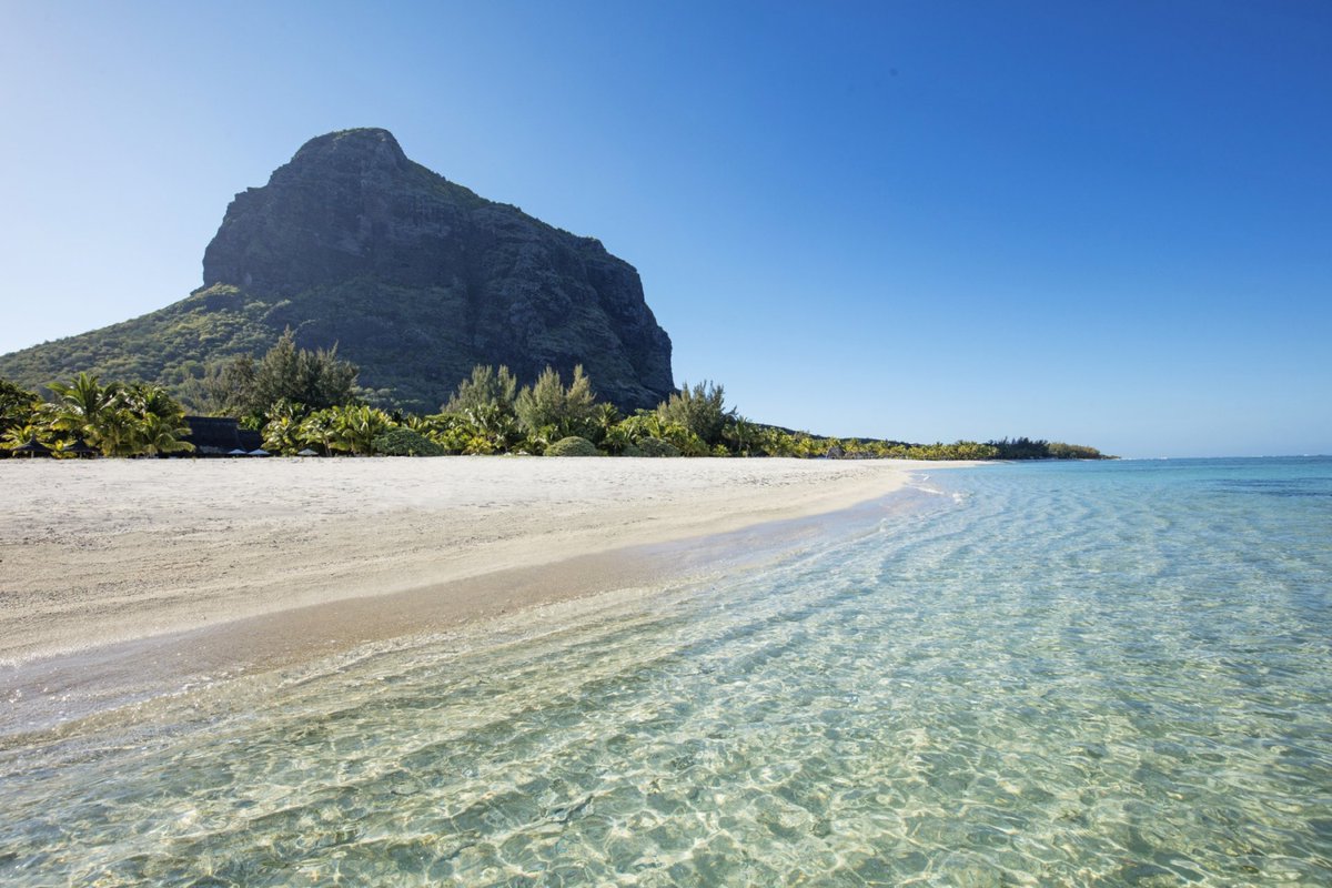 IslandStays's tweet photo. If you're dreaming of a luxury island escape where barefoot elegance meets natural beauty, consider one of Mauritius' most exceptional resorts: Dinarobin Beachcomber Golf Resort &amp; Spa. Located on the stunning Le Morne Peninsula, with the dramatic backdrop of Le Morne mountain. https://t.co/eBztcG1MwO