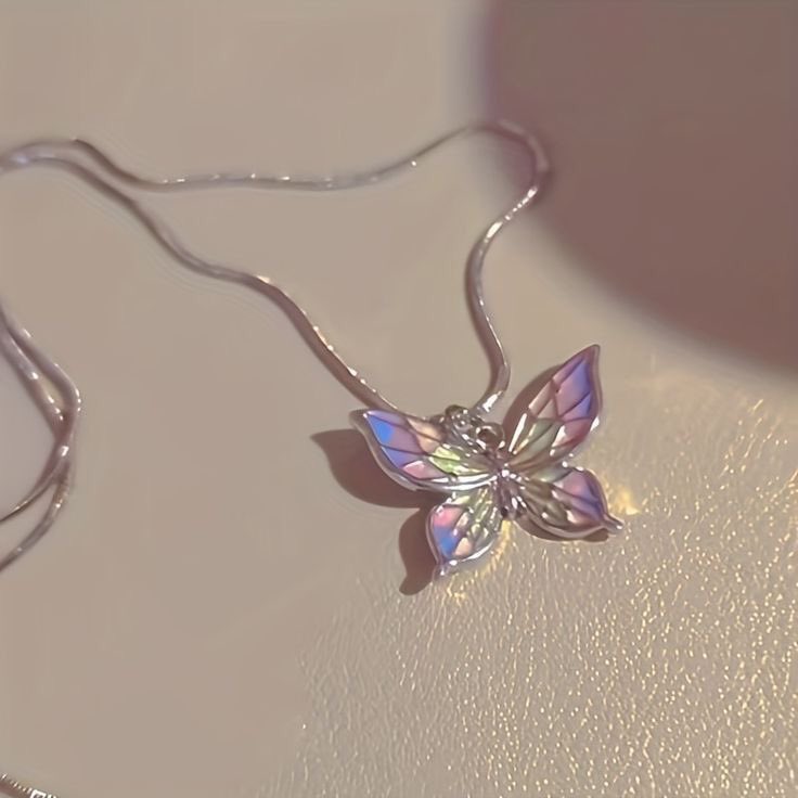 butterfly necklace.